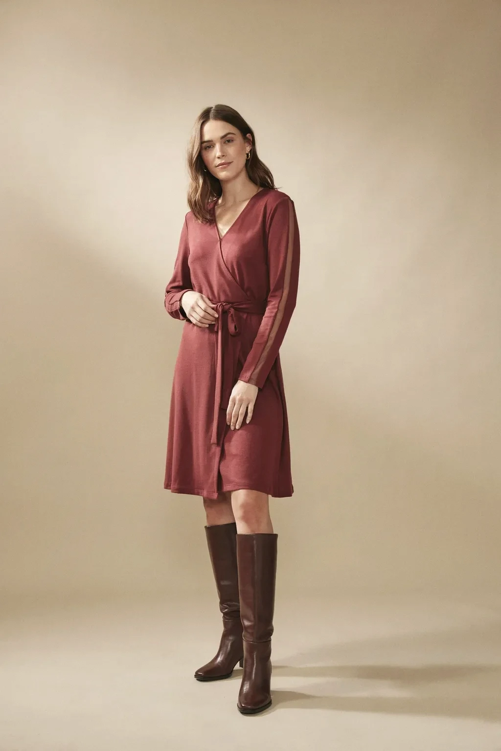 wrap dress and knee-high boots