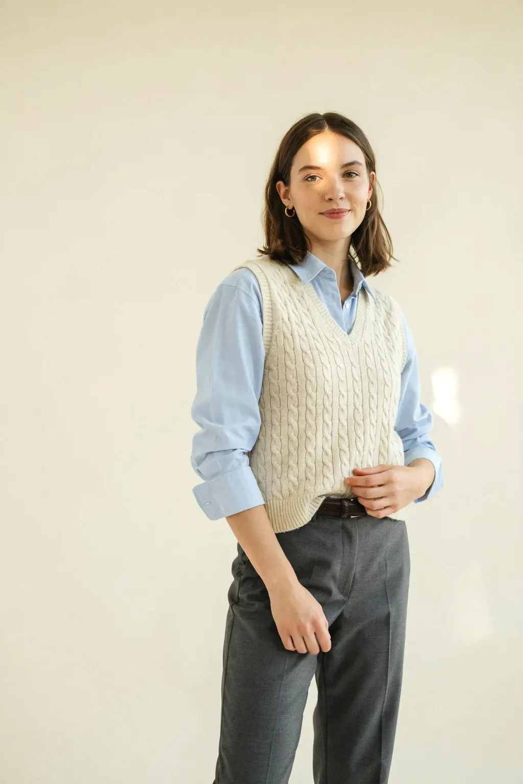 cable-knit vest and button-up