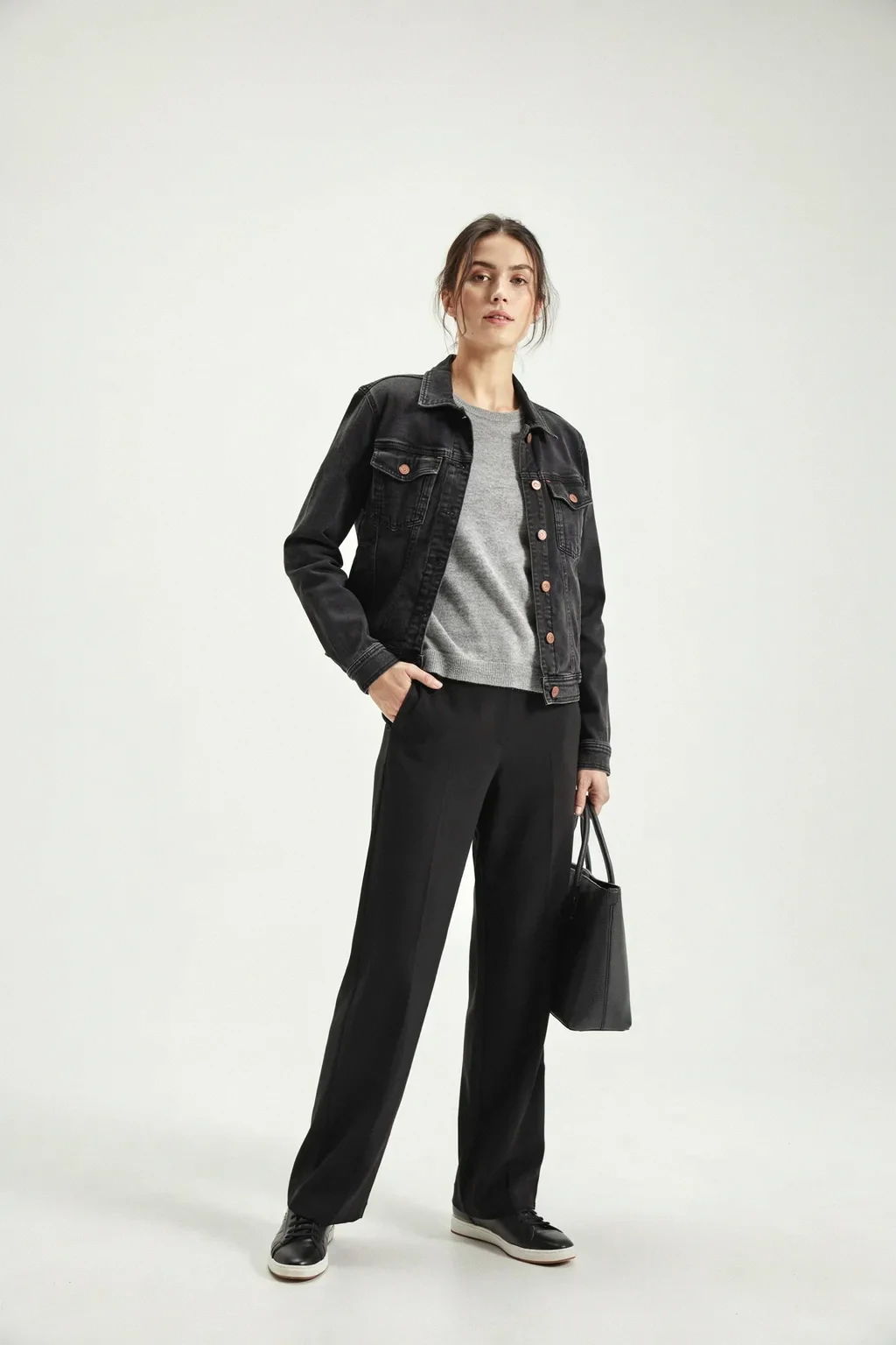 denim jacket and black trousers