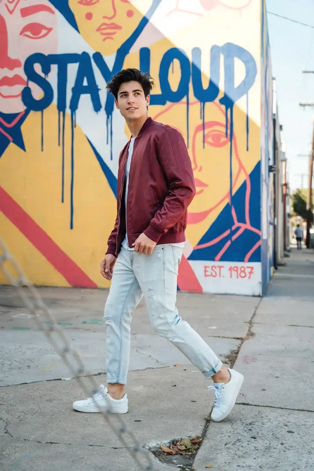 bomber jacket and distressed denim