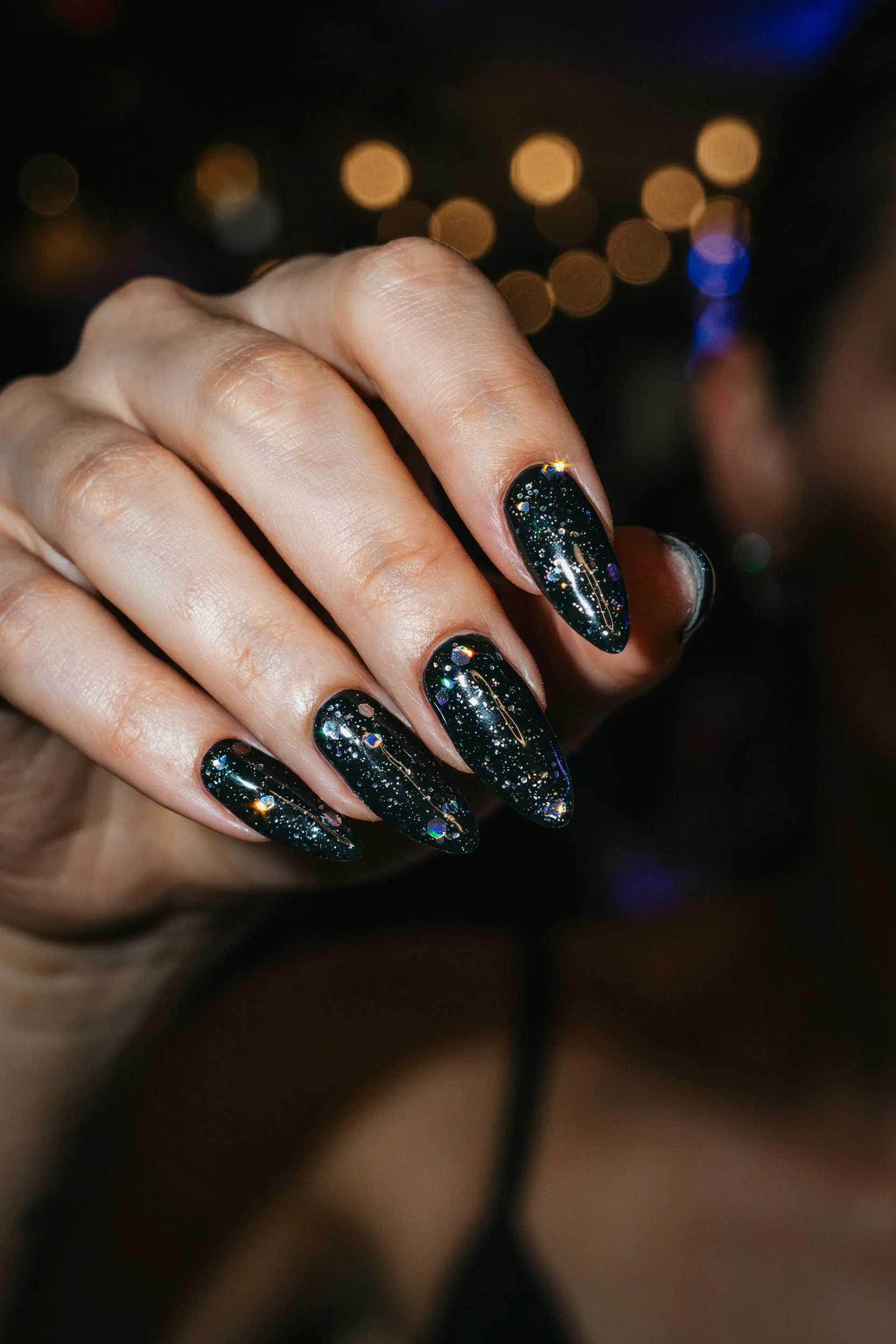 black glitter stiletto nails