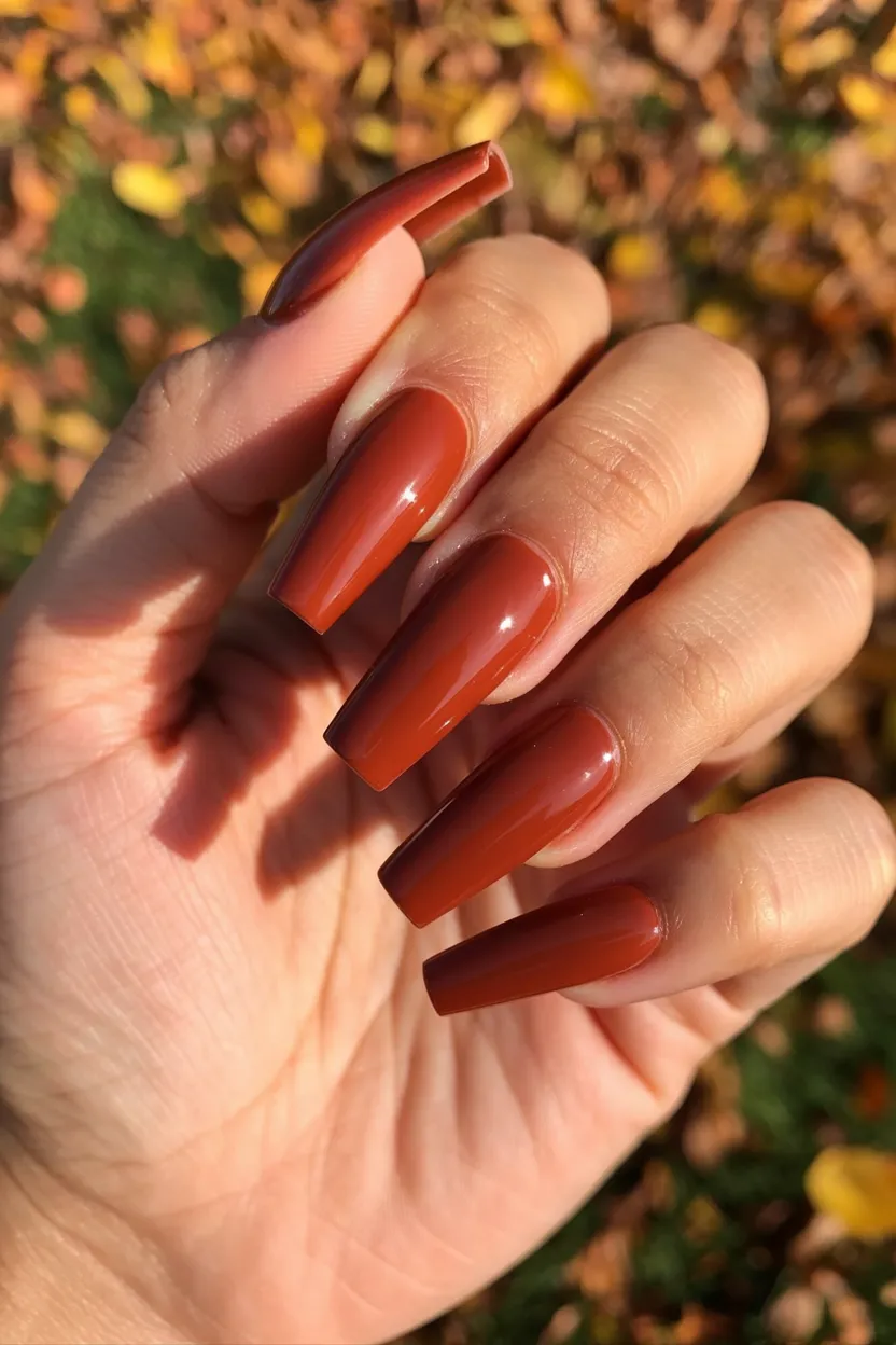 rusty red acrylic manicure